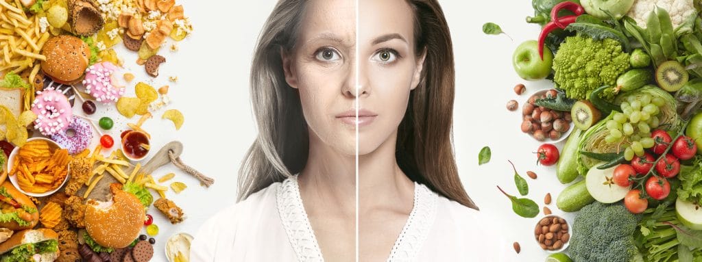 Junge Frau spiegelt ungesunde und alternative Ernährung wieder